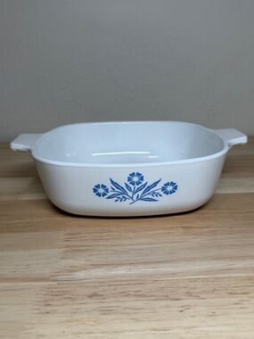 Vintage CorningWare casserole dish in the iconic "Blue Cornflower" pattern.